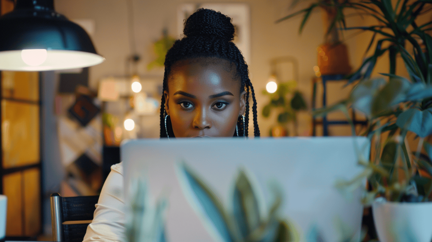 A woman editing something on a laptop